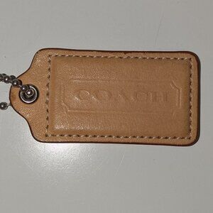Vintage tan Coach hang tag